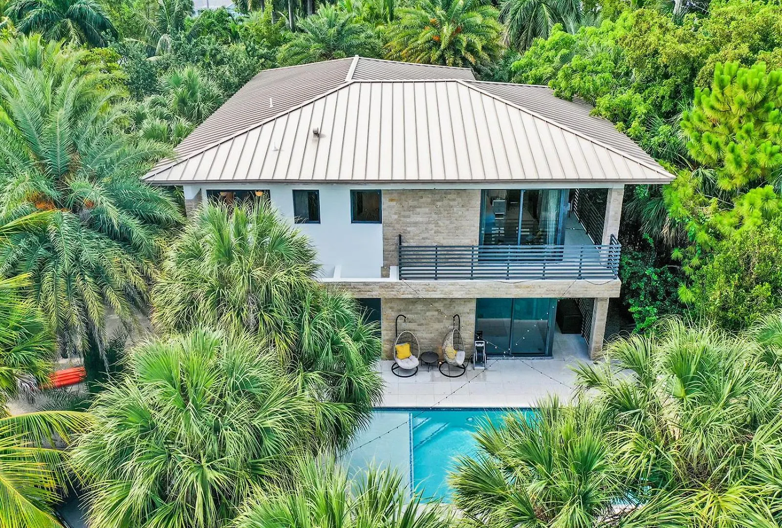Experience Warmth & Comfort In Our Stylish Balinese Waterfront Villa *