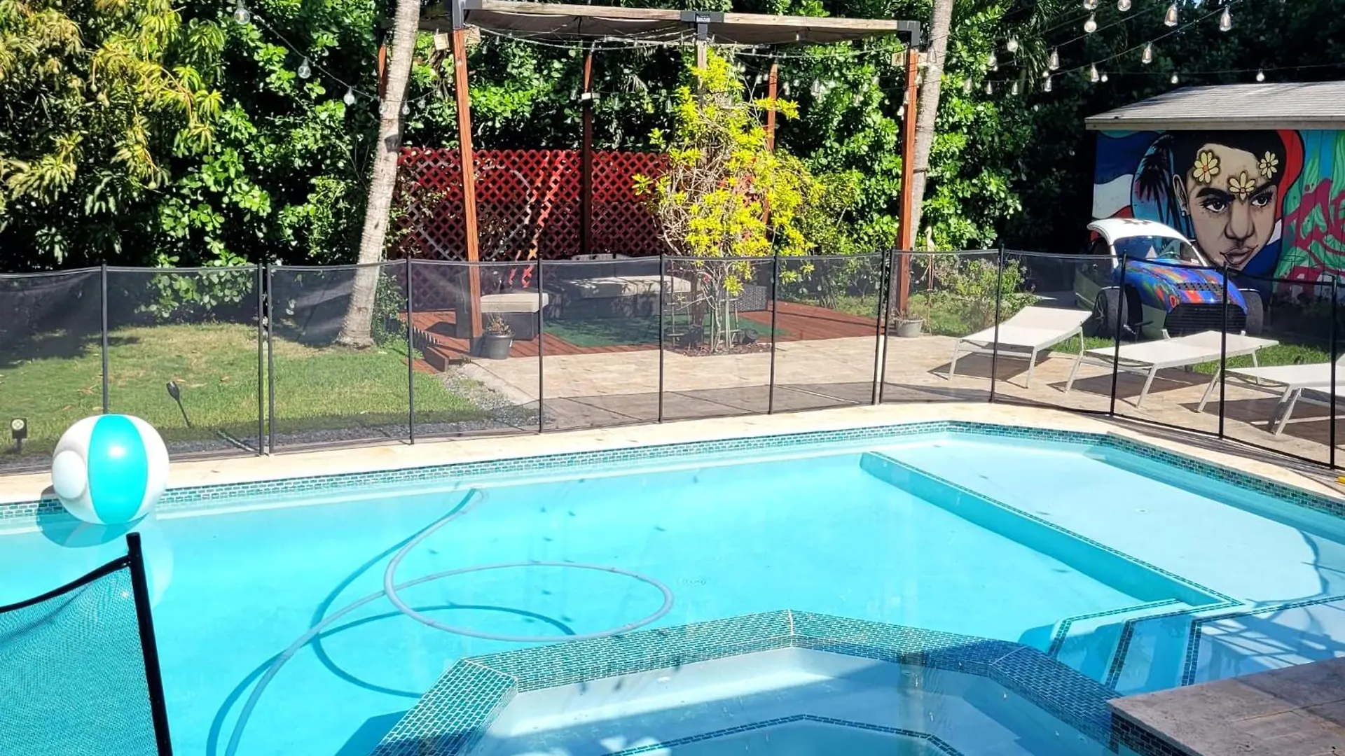 Festive Pool With Lots Of Colors And Swag.
